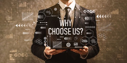 Why,Choose,Us,With,Businessman,Holding,A,Tablet,Computer,On