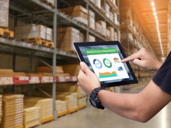 Smart,Warehouse,Management,System.worker,Hands,Holding,Tablet,On,Blurred,Warehouse